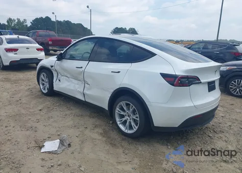2023 Tesla Model Y Awd/Long Range Dual Motor All-Wheel Drive z USA, uszkodzony, nr VIN 7SAYGDEE8PA150850